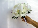 Букет невесты №35. Орхидеи, Эустома. Изысканный свадебный букет из белых экзотических цветов.